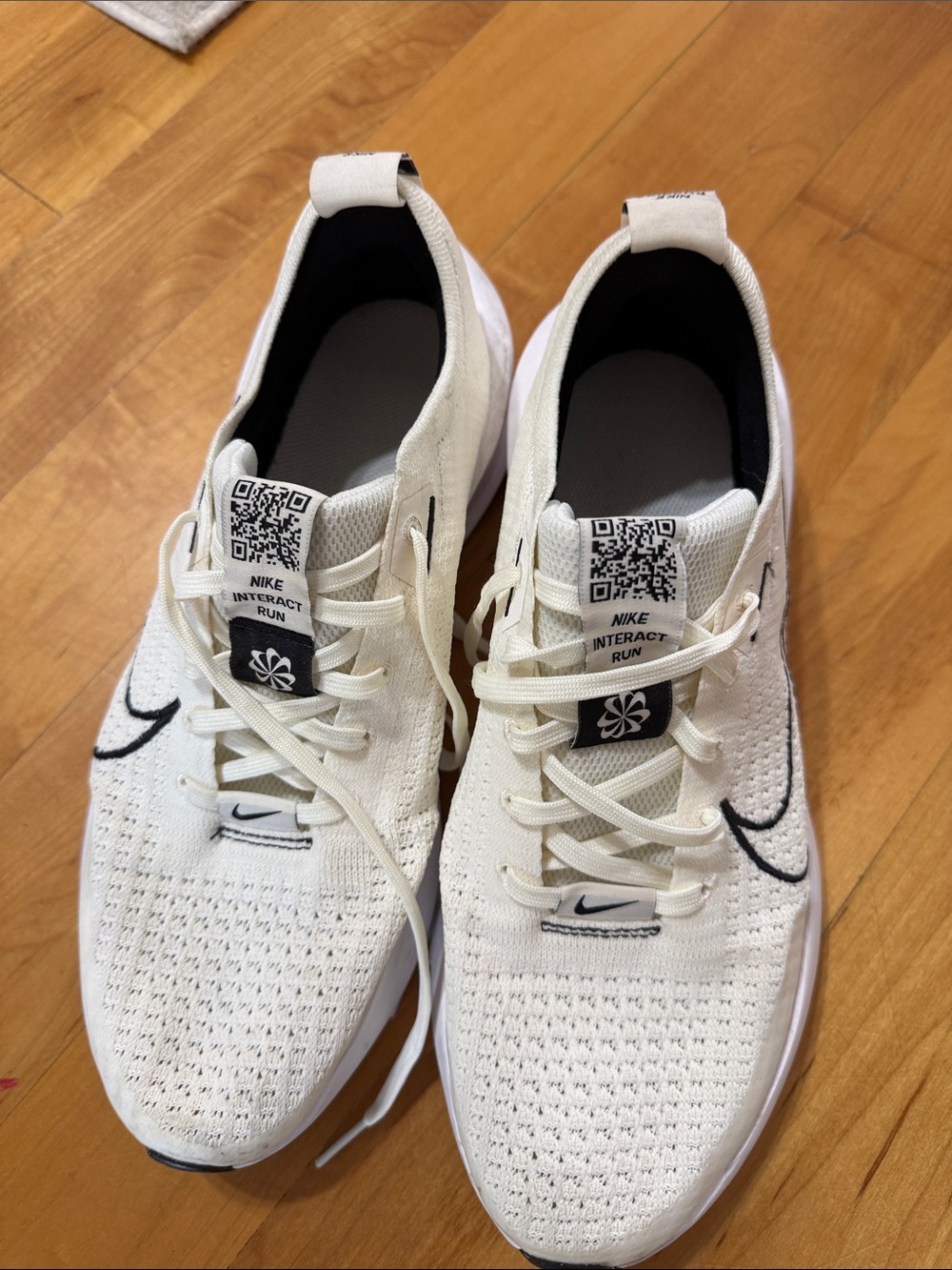 Nike Men's White Knit Running Sneakers with Black Swoosh